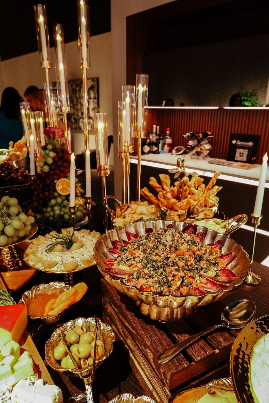 Candlelit buffet with a large platter