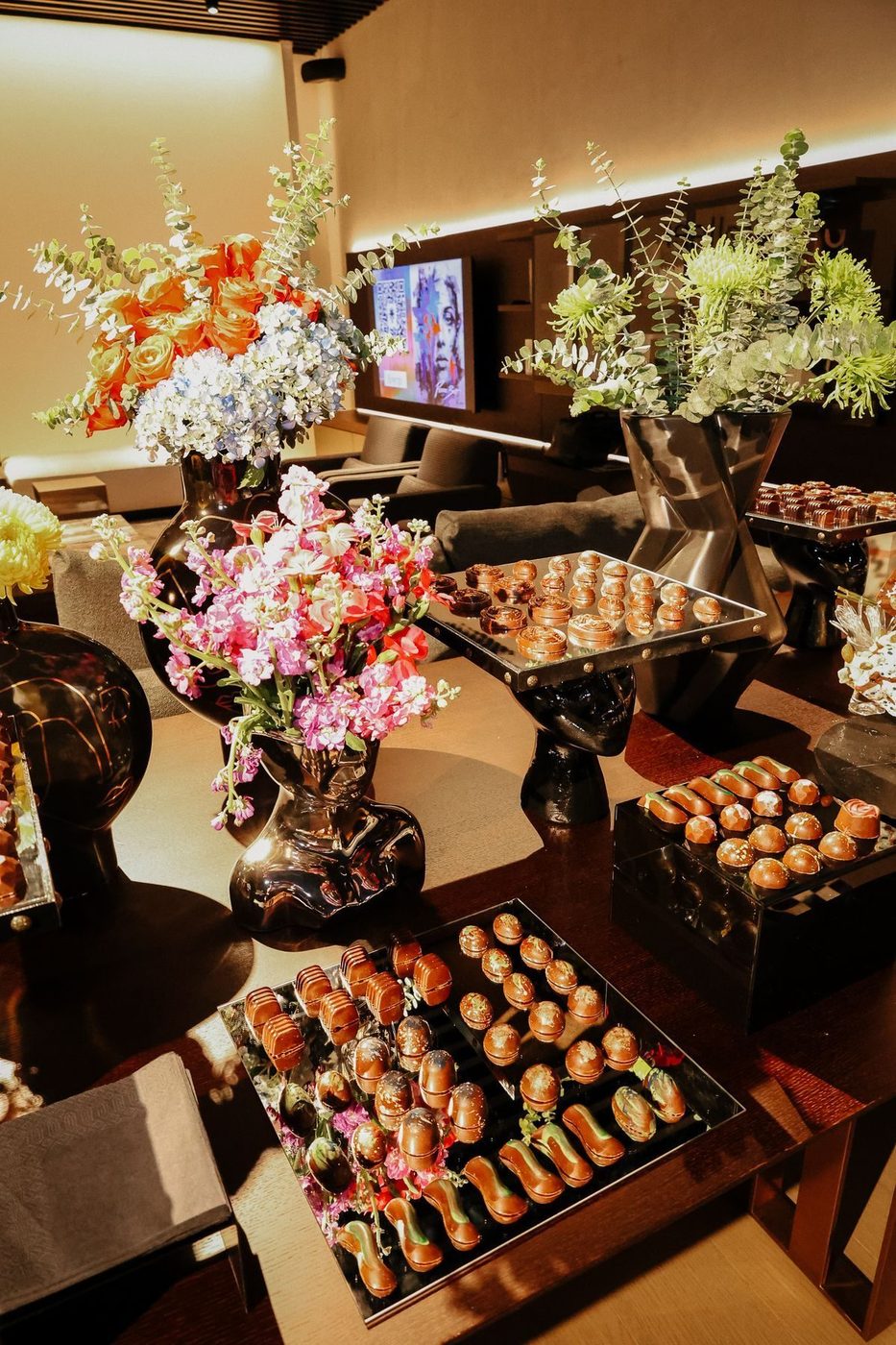 Florals and canapes on a buffet