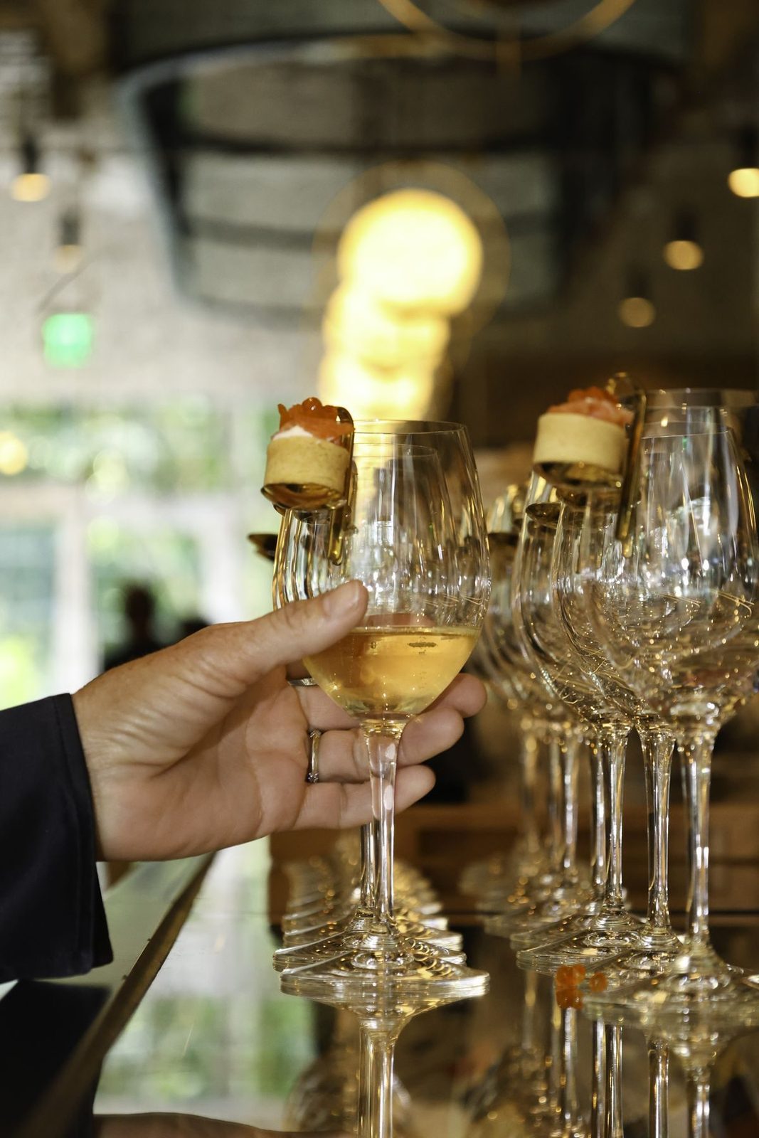 Champagne glasses with small bites